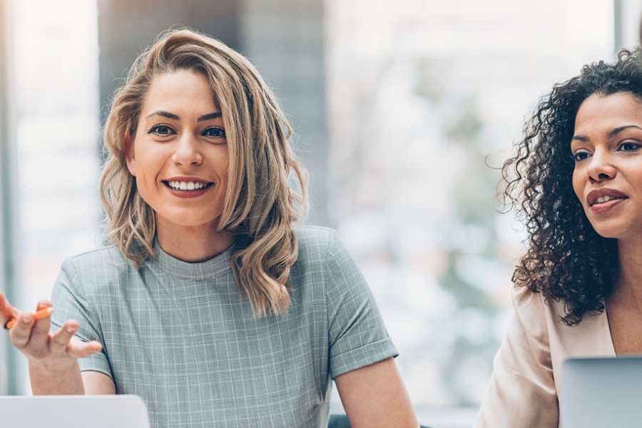 two women in a work meeting