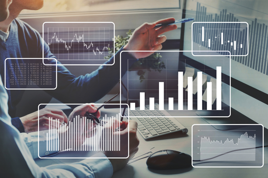 business team working on computer with big data analytics and financial charts